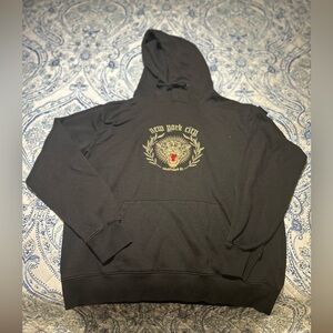 Black hoodie golden tiger logo